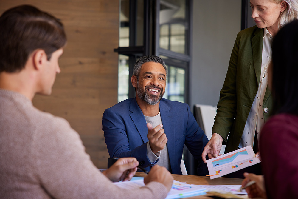 male smiling in nonprofit office setting